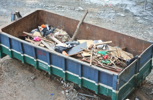 Waste collection truck in Alperton