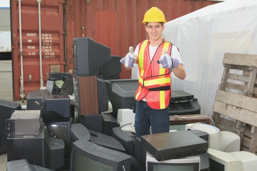 Professionals conducting flat clearance in Alperton