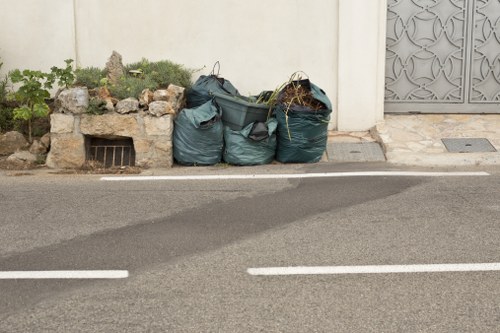Professional team organizing a garage in Alperton
